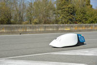 Policumbent Cerberus Bike on Runway Thumbnail