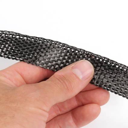 25mm Plain Weave Carbon Fibre Tape Between Fingers