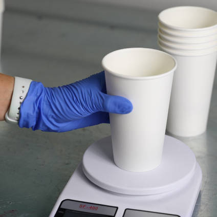 Medium Mixing Cups in Use Weighing Resin on Scales
