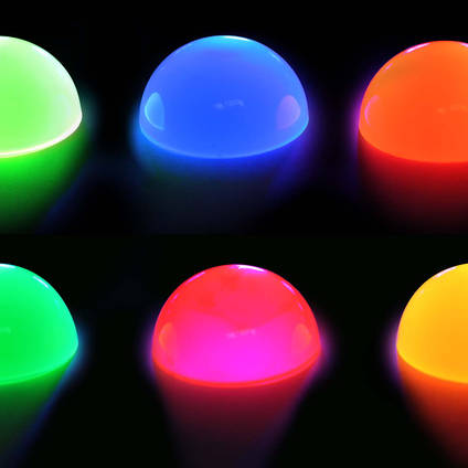 Examples of Cast Resin Domes, Tinted with Neon Resin Tinting Pigments, Glowing Under UV Light