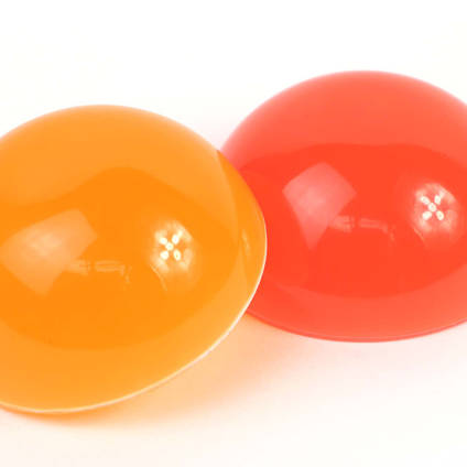 Orange and Red Example Resin Domes Tinted Using Neon Resin Tinting Pigments