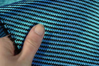 Blue Carbon Fibre Cloth 2x2 Twill In Hand Closeup Thumbnail