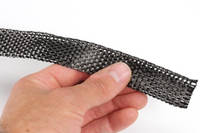 25mm Plain Weave Carbon Fibre Tape Between Fingers Thumbnail