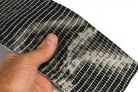 250g Unidirectional Carbon Fibre Tape (100mm) in Hands Thumbnail