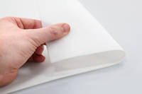 Airex® T10.100 PET foam being folded over by hand Thumbnail